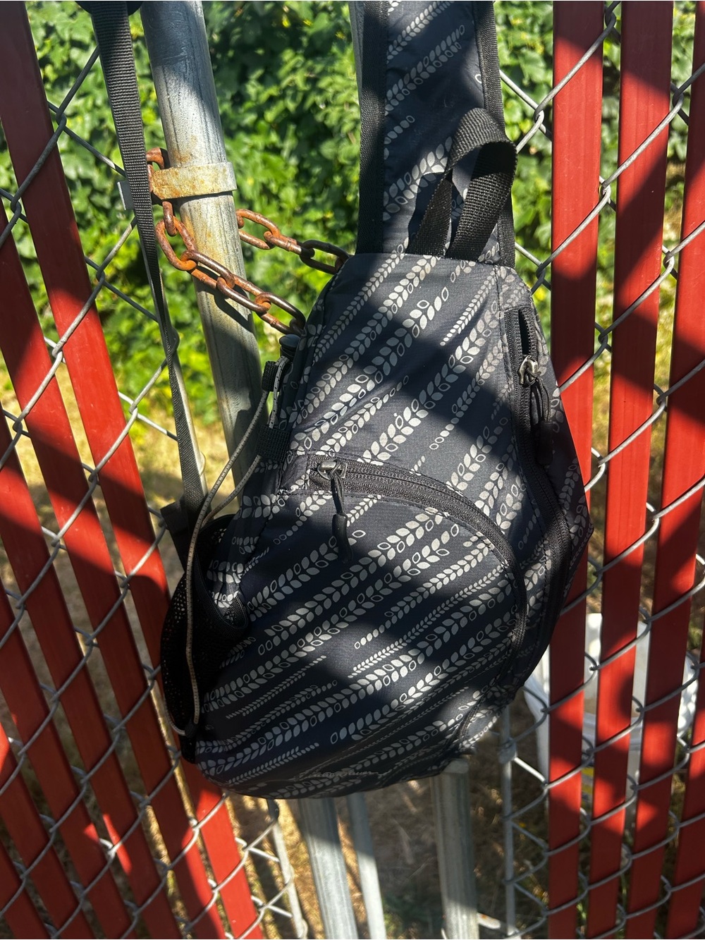 Eddie Bauser Men’s Black Patterned Crossbody Sling Bag backpack